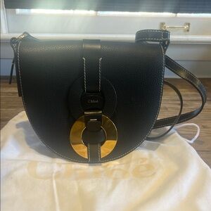 Chloé Black Crossbody Saddle Bag with Gold Ring Accent